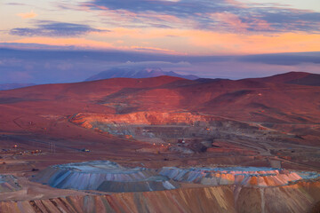 View from above of the pit of an open-pit copper mine in Chile