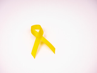 Żółta wstążka na białym tle - endometrioza - obrazy, fototapety, plakaty