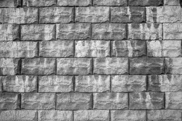 Black and white brick wall background. Detail of a Black and white brick wall texture.