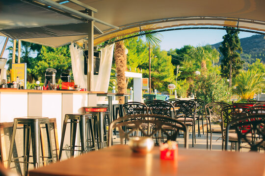 Toroni , GREECE - SEPTEMBER 23, 2014: summer cafe on the beach in Greece on the Mediterranean Sea at sunset
