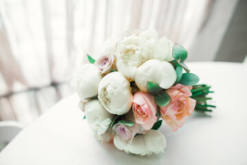 Beautiful wedding bouquet with different flowers, roses