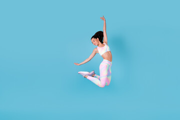 Full size photo of energetic japanese lady jump high enjoy weight loss wear trendy look for sports...