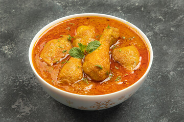 Chicken curry isolated on texture background.