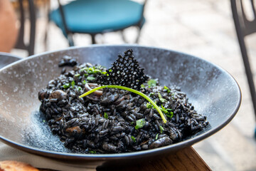 Black Ink Risotto with squids