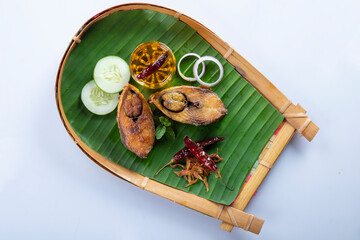 Ilish bhaji for Panta ilish, Bengali new year festive dish. Fried Hilsha slices with chilli, tomato and onion. Hilsa fry is popular in pohela boishakh. on kula.