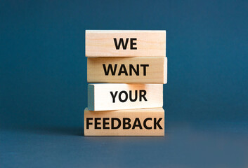 Support and we want your feedback symbol. Concept words We want your feedback on wooden blocks on beautiful grey table grey background. Business, support we want your feedback concept.
