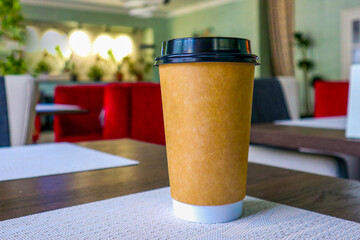 mockup paper craft cup for coffee on the table