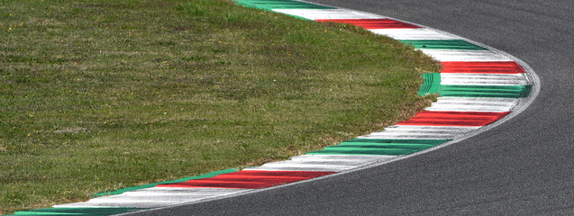 curb on a racing track. panoramic banner image