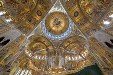 Fototapeta na wymiar Interior of Saint Sava temple in Belgrade, Serbia, gold mosaic touristic attraction