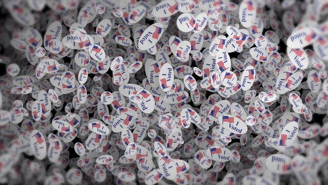 Looping animation of slowly rotating white "I Voted" stickers on a black background with soft edges