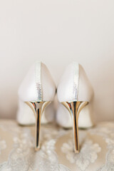 White wedding shoes for women. high heels. back view.