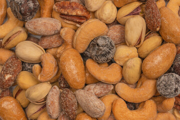  A group of almonds, pistachios, walnuts, macadamia, cashews.