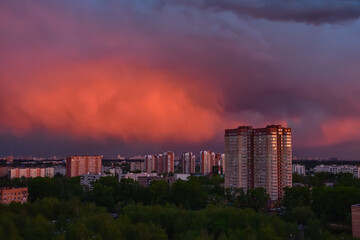 Fototapeta na wymiar Colorful sunset over city, bright colorful sky over city