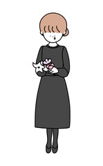 花を持って泣いている喪服のお姉さん白