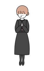 数珠を持って拝む泣いている喪服のお姉さん白