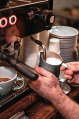 Fototapeta na wymiar maker pouring coffee