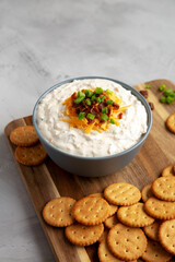 Homemade Crack Dip Appetizer in a Bowl, side view. Copy space.