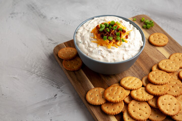 Homemade Crack Dip Appetizer in a Bowl, side view. Space for text.