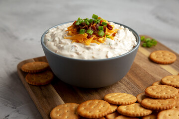 Homemade Crack Dip Appetizer in a Bowl, side view. Close-up.