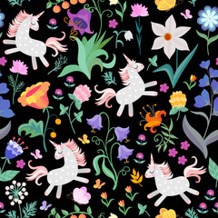 Sweet seamless pattern with cute unicorns and colorful flowers on black background in vector.