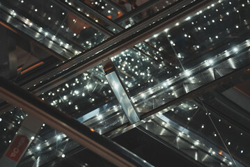 Electric escalators in metro. Moving staircases.