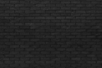 Fototapeta na wymiar Black brick wall. Dark surface texture. Architectural building background.