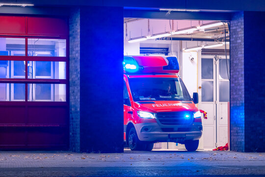Ambulance at night, blue light, fire department, berlin, germany, abstract