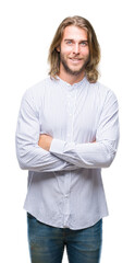 Young handsome man with long hair over isolated background happy face smiling with crossed arms looking at the camera. Positive person.