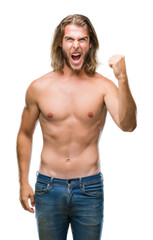 Fototapeta premium Young handsome shirtless man with long hair showing sexy body over isolated background angry and mad raising fist frustrated and furious while shouting with anger. Rage and aggressive concept.