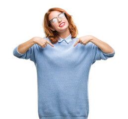 Young beautiful woman over isolated background wearing winter sweater looking confident with smile on face, pointing oneself with fingers proud and happy.