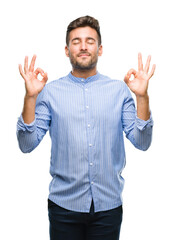 Young handsome man over isolated background relax and smiling with eyes closed doing meditation gesture with fingers. Yoga concept.