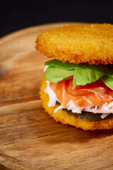 sushi menu with burger made from rice and smoked salmon, avocado, light cheese and nori