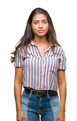 Obraz premium Young beautiful arab woman over isolated background with serious expression on face. Simple and natural looking at the camera.