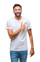 Fototapeta premium Adult hispanic man over isolated background cheerful with a smile of face pointing with hand and finger up to the side with happy and natural expression on face looking at the camera.