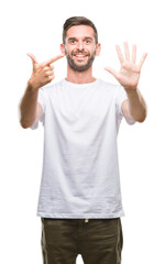 Young handsome man over isolated background showing and pointing up with fingers number seven while smiling confident and happy.