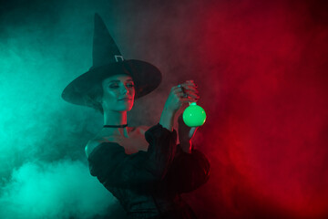 Photo of creepy warlock lady doing ritual make toxic potion flask isolated on bright gradient color background