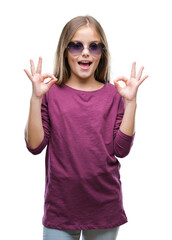 Obraz na płótnie Canvas Young beautiful girl wearing sunglasses over isolated background relax and smiling with eyes closed doing meditation gesture with fingers. Yoga concept.