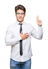 Young business man wearing glasses over isolated background Swearing with hand on chest and fingers, making a loyalty promise oath