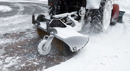 Clearing the road from the snow.