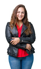 Obraz premium Beautiful plus size young woman wearing a fashion leather jacket over isolated background happy face smiling with crossed arms looking at the camera. Positive person.