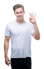 Young handsome blond man doing ok sign with fingers, excellent symbol