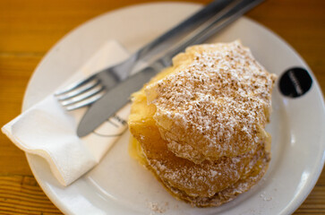 Fresh and delicate puff pastry with egg cream inside