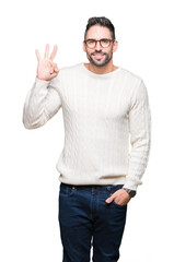 Naklejka premium Young handsome man wearing glasses over isolated background showing and pointing up with fingers number three while smiling confident and happy.