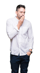 Fototapeta premium Young business man over isolated background bored yawning tired covering mouth with hand. Restless and sleepiness.