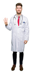 Fototapeta premium Young handsome doctor man wearing medical coat showing and pointing up with fingers number four while smiling confident and happy.