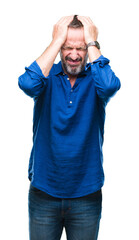 Fototapeta premium Middle age hoary senior man over isolated background suffering from headache desperate and stressed because pain and migraine. Hands on head.
