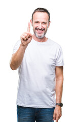 Middle age hoary senior man wearing white t-shirt over isolated background showing and pointing up with finger number one while smiling confident and happy.