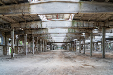 Ruined industrial area, abandoned ruins of a plant or factory. Huge vacant lot. Background