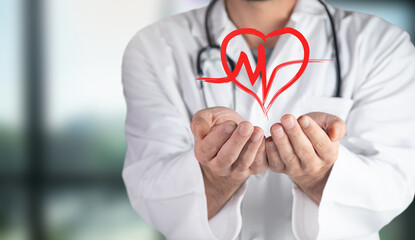 Doctor holding a heart in his hand