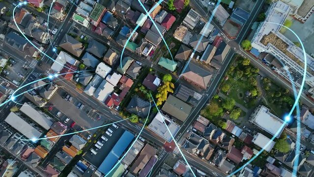 空撮した住宅地と通信ネットワーク